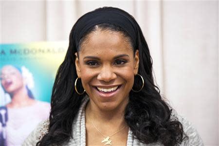 Actress Audra McDonald poses for a photograph while promoting the play "Lady Day at Emerson's Bar and Grill" in New York March 17, 2014. REUTERS/Lucas Jackson