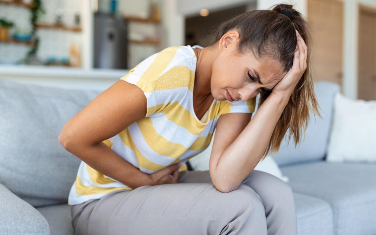 Woman with stomach pain