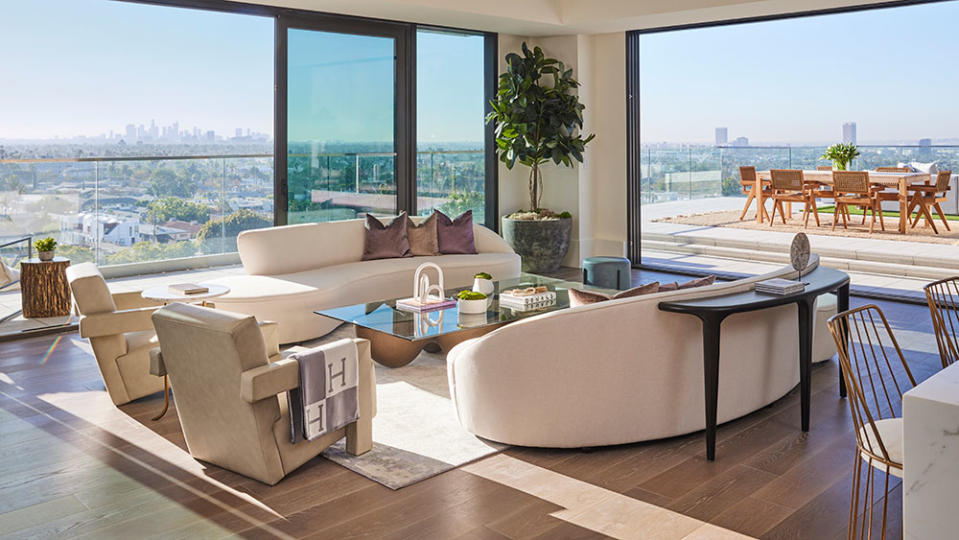 A living room at Pendry Residences West Hollywood opens on to a terrace. - Credit: Photo: Justin Coit