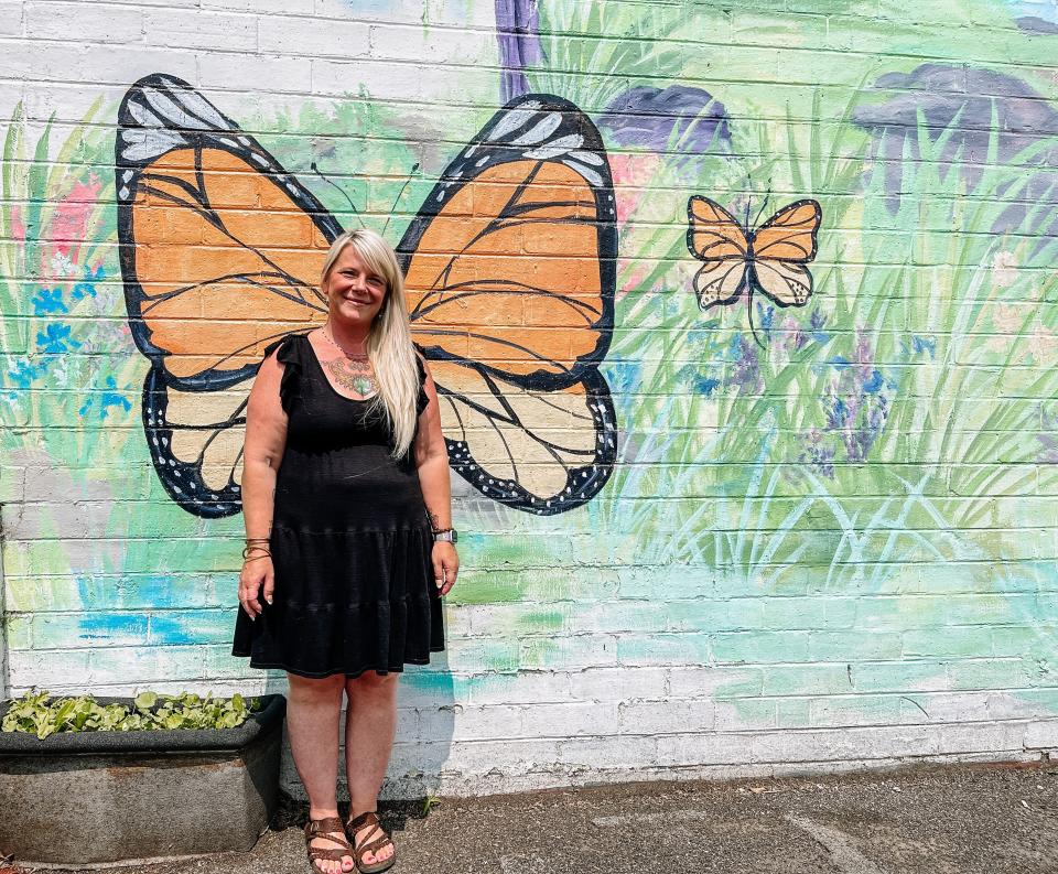 "Meet me at the mural." Meleah McCammon, owner of Inner Perfect’s Curiosity Shop, is co-hosting a Midsummer Block Party and market on June 24, 2023, in South Knoxville.