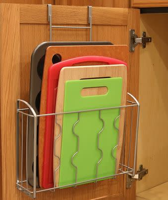 An over-the-cabinet-door holder so you can fit even more cooking sheets and cutting boards