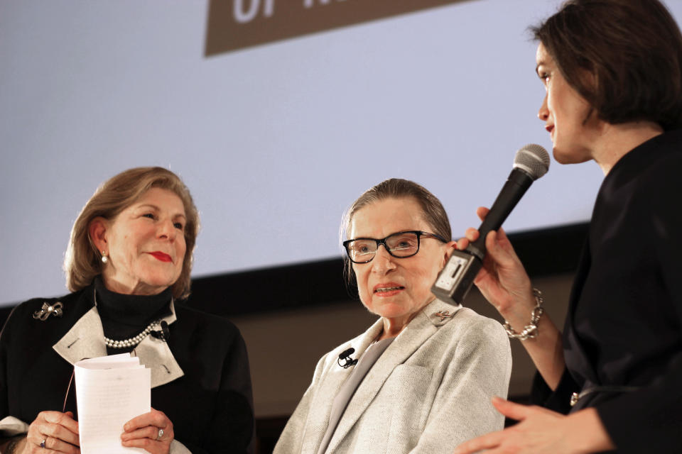 NPR's Nina Totenberg, left, and U.S. Supreme Court Justice Ruth Bader Ginsburg are thanked by Whitney W. Donhauser, president of the Museum of the City of New York, after participating in the David Berg Distinguished Speakers Series Saturday, Dec. 15, 2018, in New York. NPR legal correspondent Totenberg led a question-and-answer session about Ginsburg's quarter century on the Supreme Court, and about her life. (AP Photo/Rebecca Gibian)