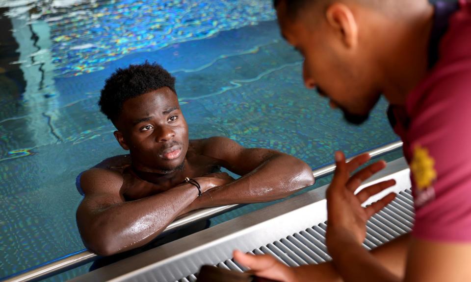 <span>Bukayo Saka takes in some rigorous coaching advice in the swimming pool of Spa & Golf Resort Weimarer Land. Obviously.</span><span>Photograph: Eddie Keogh/The FA/Getty Images</span>