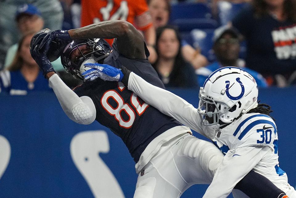 Indianapolis Colts cornerback Darius Rush (30) is unable to stop a touchdown reception by Chicago Bears wide receiver Daurice Fountain (82) during the second half of an NFL preseason game Saturday, Aug. 19, 2023, at Lucas Oil Stadium in Indianapolis.