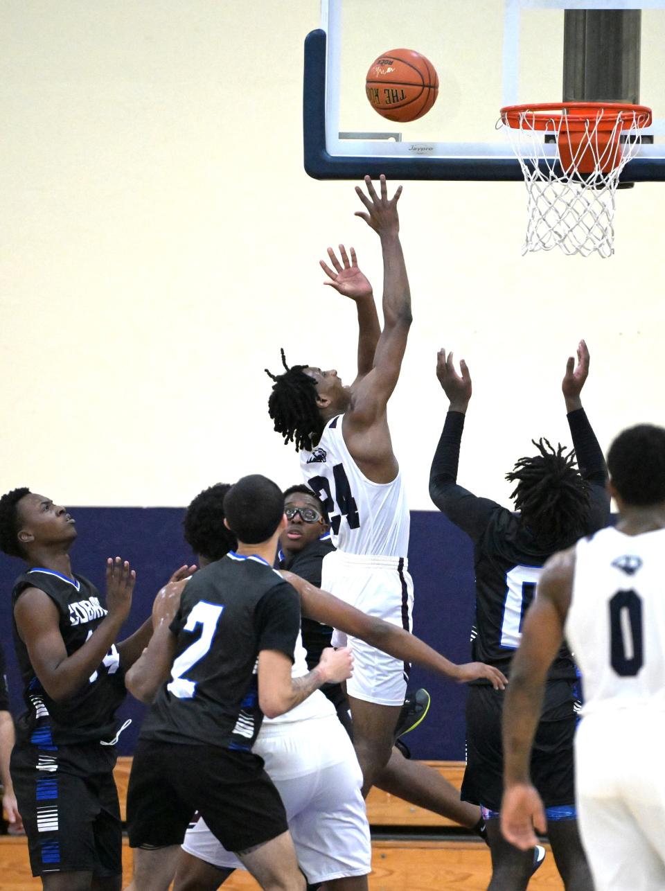 Dwyer guard Jaelen Nelsen (24) brings down a rebound against Park Vista in an HBC Showcase game on Dec. 28, 2023.