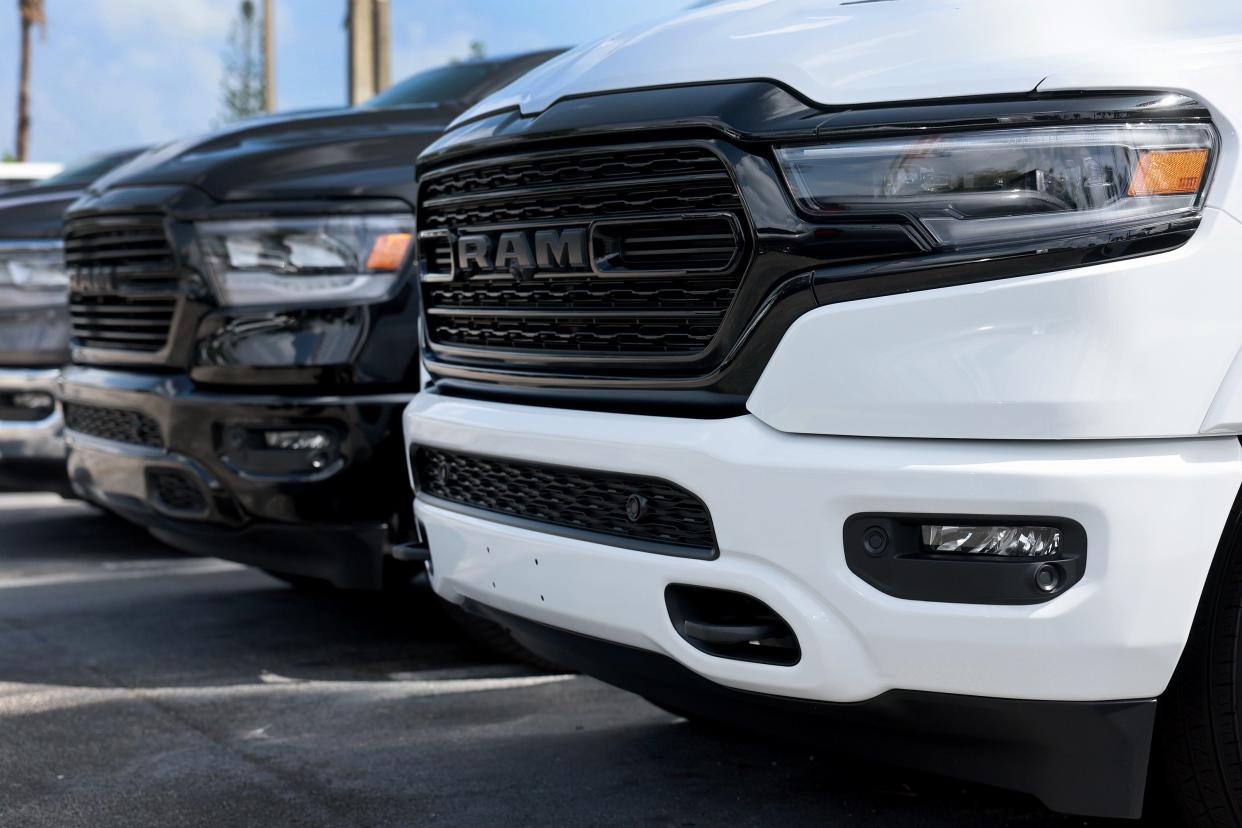 New Ram vehicles sit on a Dodge Chrysler-Jeep Ram dealership's lot on October 03, 2023 in Miami, Florida.