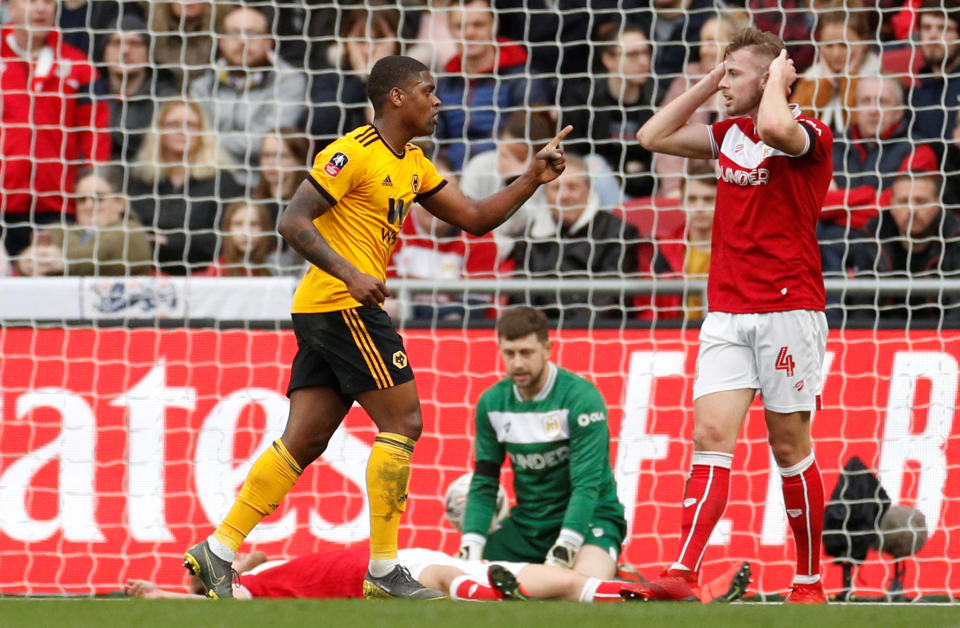 Wolverhampton Wanderers striker Ivan Cavaleiro, left, celebrates after scoring against Bristol City. (Reuters)