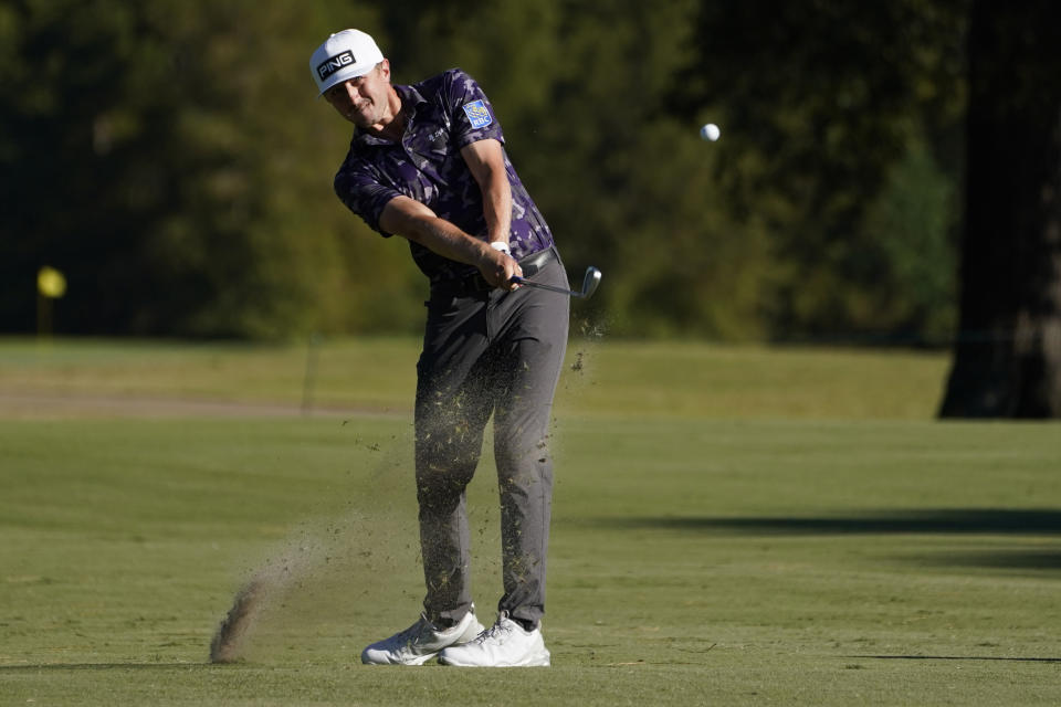 Mackenzie Hughes, of Canada, hits from the 18th fairway during the second roun of the Sanderson Farms Championship golf tournament in Jackson, Miss., Friday, Sept. 30, 2022. (AP Photo/Rogelio V. Solis)