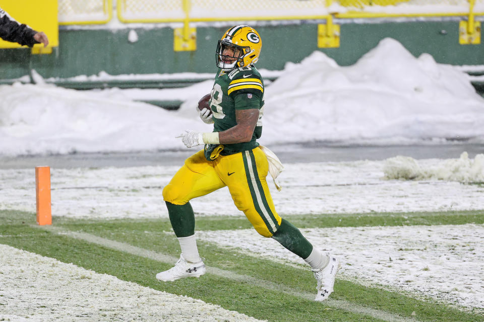 AJ Dillon's breakout game for the Packers came against the Titans, but he'll have to wait for a Derrick Henry-like workload over a whole season. (Photo by Dylan Buell/Getty Images)