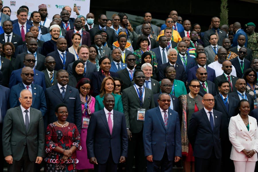 Head of states and delegates pose for a group photo, during the official opening of the Africa Climate Summit at the Kenyatta International Convention Centre in Nairobi, Kenya, Monday, Sept. 4, 2023. The first African Climate Summit opened with heads of state and others asserting a stronger voice on a global issue that affects the continent of 1.3 billion people the most, even though they contribute to it the least. (AP Photo/Khalil Senosi)