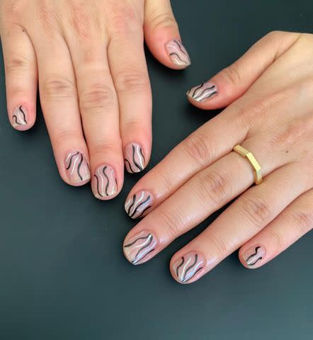 <p>Kim Truong Instagram</p> Minimal line nails on Awkwafina