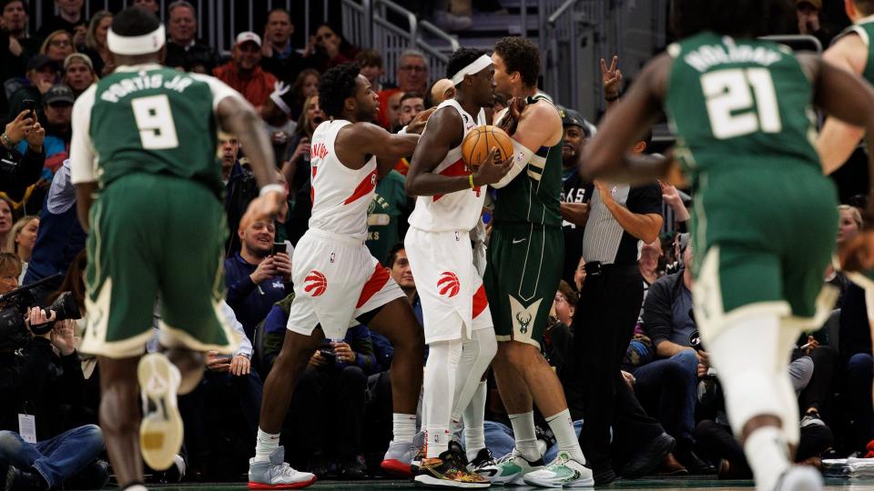 Gary Trent Jr. and Brook Lopez got tangled up late as tensions flared in the Bucks win over the Raptors on Tuesday. (Reuters)