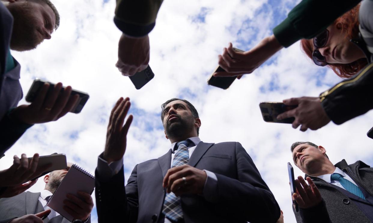 <span>Humza Yousaf speaking to the media in Dundee. He offered an olive branch to the Scottish Greens, saying he had ‘heard their anger’.</span><span>Photograph: Andrew Milligan/PA</span>