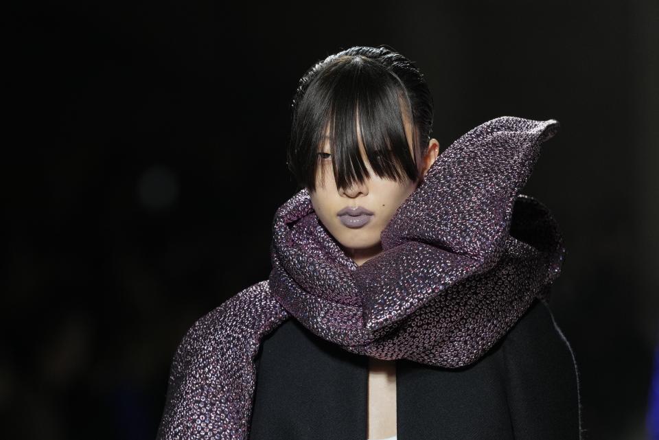 A model wears a creation as part of the Dries Van Noten Fall/Winter 2024-2025 ready-to-wear collection presented Wednesday, Feb. 28, 2024 in Paris. (Photo by Scott A Garfitt/Invision/AP)