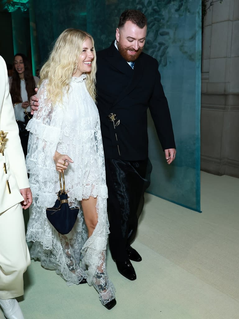 <p>Sienna Miller and Sam Smith</p>