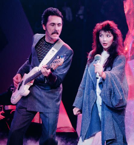 <p>ZIK Images/United Archives via Getty</p> Del Palmer and Kate Bush performing in 1985