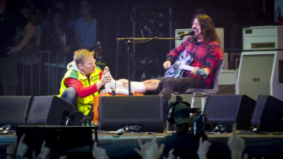 Grohl continued performing despite breaking his leg. Copyright: [Rex]