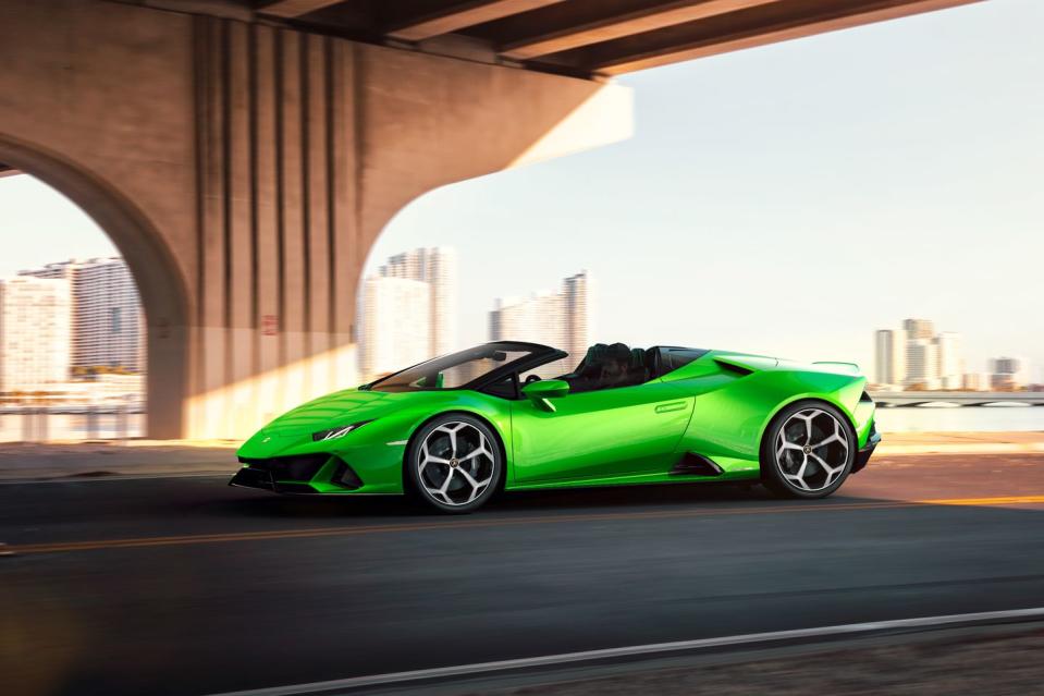 <p>The side view differs slightly, in that the soft top deviates slightly from the coupe's profile when up; it is hidden when the top is down to emphasize the Spyder's open-air nature. </p>