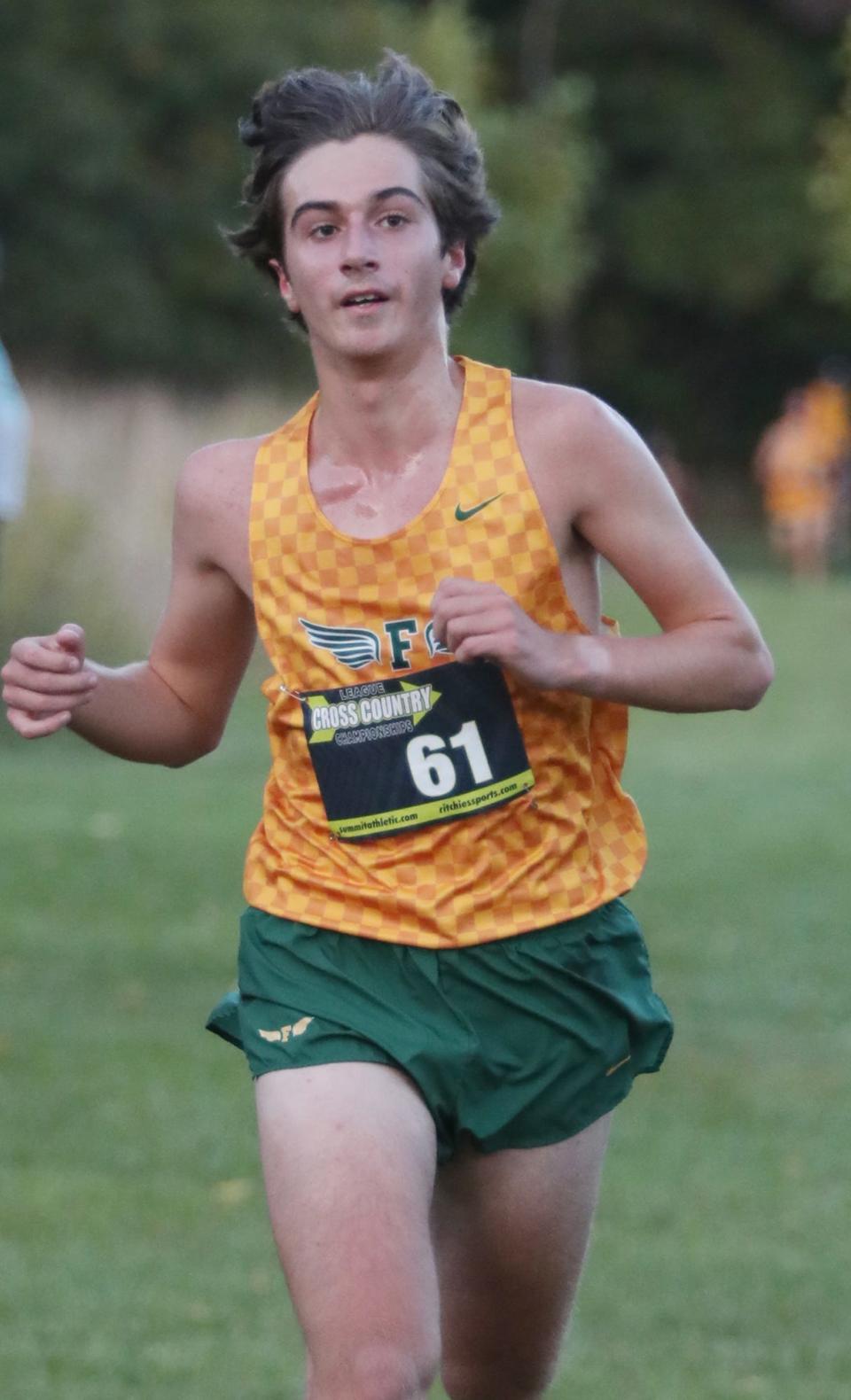 Firestone's David Burkholder comes in second in the City Series cross country championship at Goodyear Heights, Wednesday, Oct. 11, 2023.