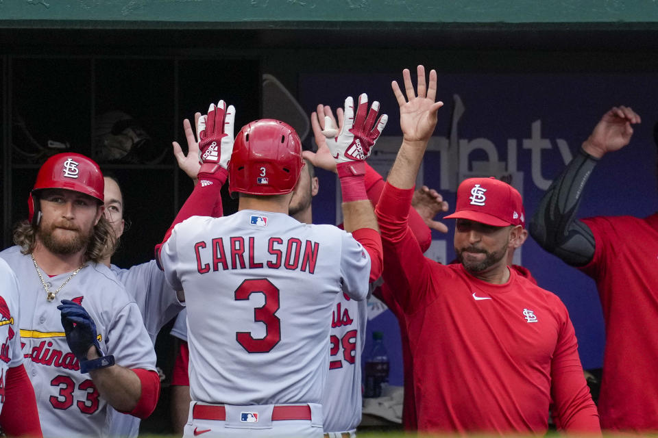 St. Louis Cardinals' Dylan Carlson is congratulated for his two-run home run against the Washington Nationals during the second inning of a baseball game at Nationals Park, Tuesday, June 20, 2023, in Washington. (AP Photo/Alex Brandon)