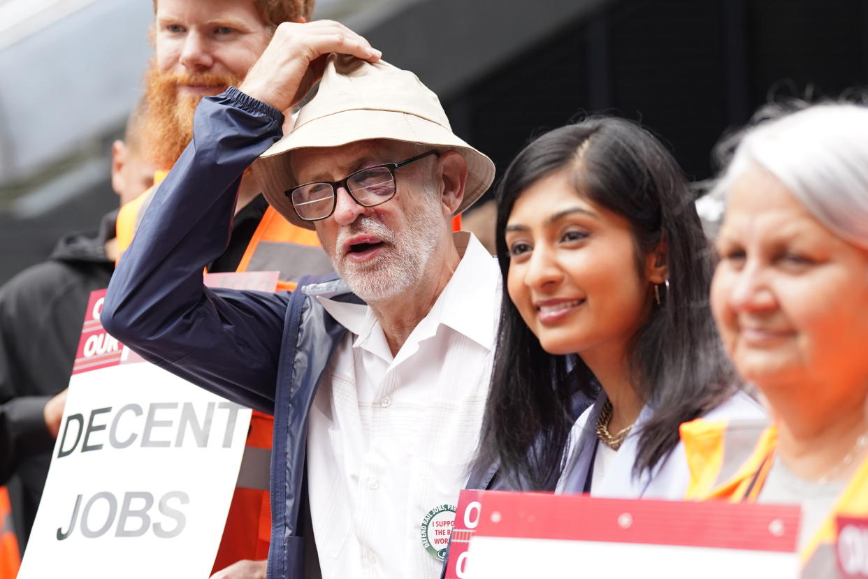 Jeremy Corbyn (2nd left), Zarah Sultana, MP for Coventry South and Mick Lynch, general secretary of the Rail, Maritime and Transport union (RMT) (right) on the picket line outside London Euston train station. Picture date: Thursday August 18, 2022.