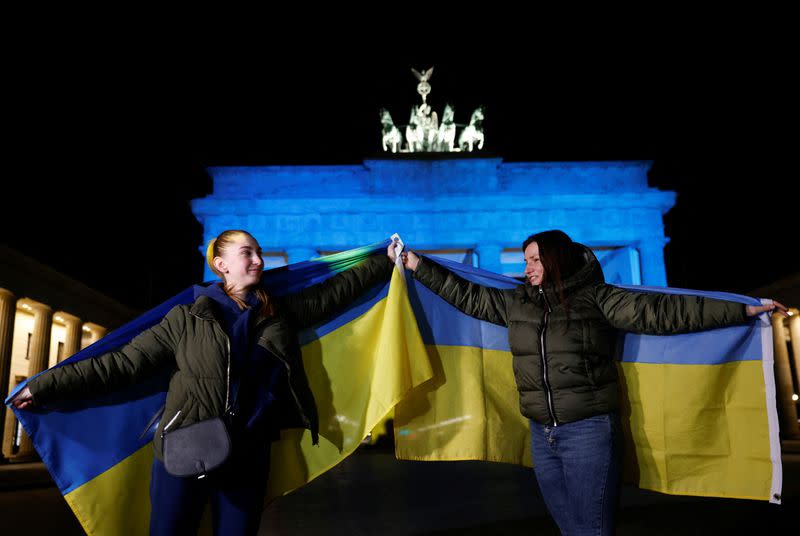 Brandenburg Gate is illuminated in Ukrainian national colors, in Berlin