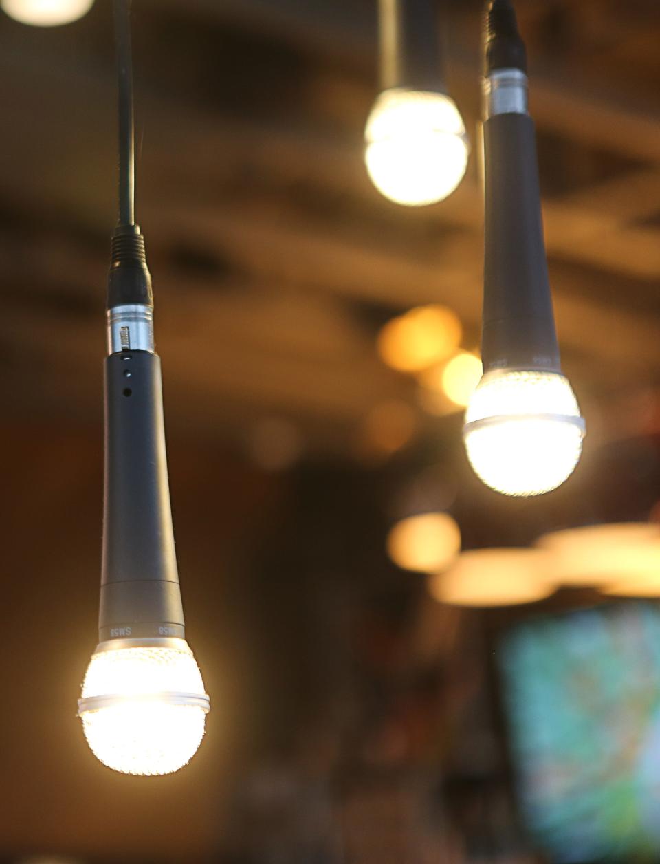 Light fixtures were built into microphones that are situated over the table of Taco Reho in Middletown as seen in this photo on Wednesday April 3, 2024.