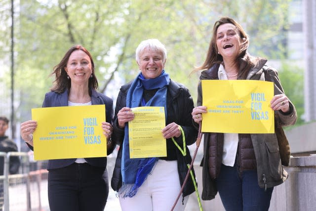 A group of would-be hosts, sponsors and supporters of Ukrainian refugees, hold a Vigil for Visas outside the Home Office in London (James Manning/PA)