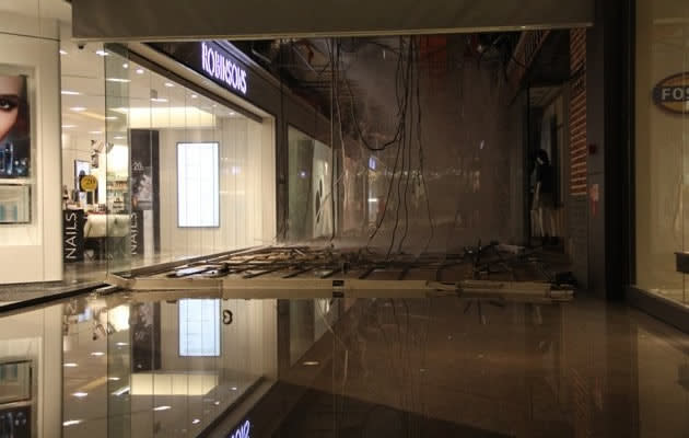 Yahoo Newsroom - The first-floor ceiling of Jem mall in Jurong East collapsed on Wednesday night. (Photo courtesy of Toh Ee Ming)