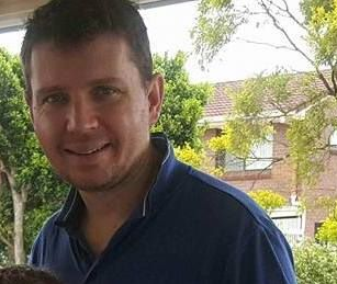 Passenger Christopher Woodgate, 38, was pronounced dead after the Brisbane-bound flight was diverted to Honolulu on Saturday. Source: Facebook