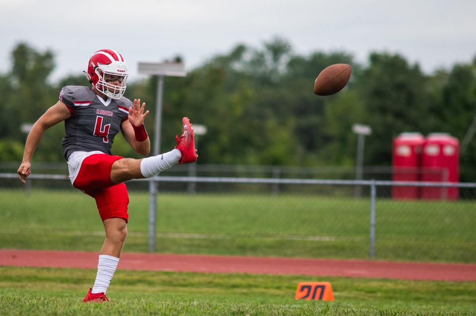 Red Hook's Landon Ramsey punts during a Sept. 9, 2023 football game against O'Neill.