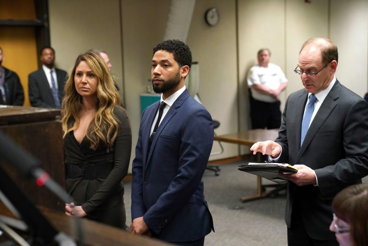 Actor Jussie Smollett attends Leighton Criminal Court with his attorney Tina Glandian (L) on March 14, 2019, in Chicago. - Smollett pleaded not guilty on Thursday to charges he lied to police about being the victim of a racist, homophobic hate crime.