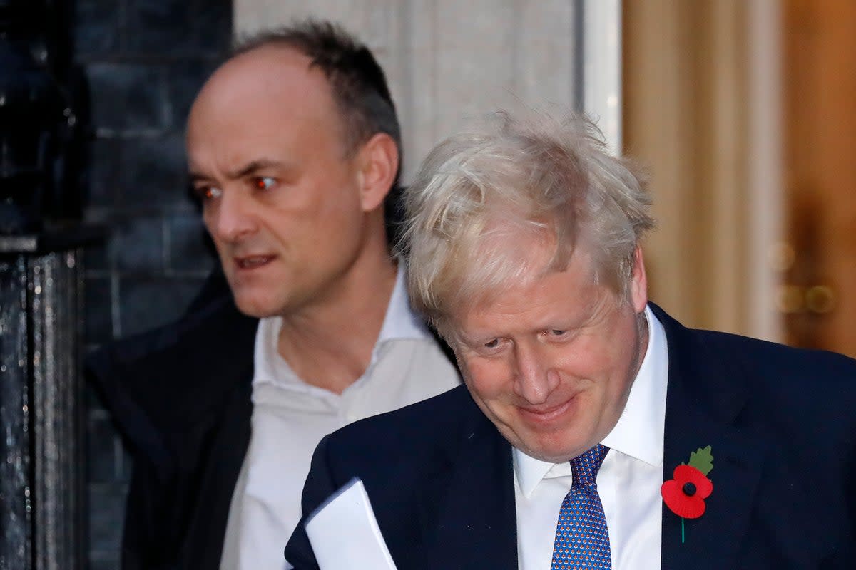 Boris Johnson and Dominic Cummings leave Downing Street (AFP/Getty)