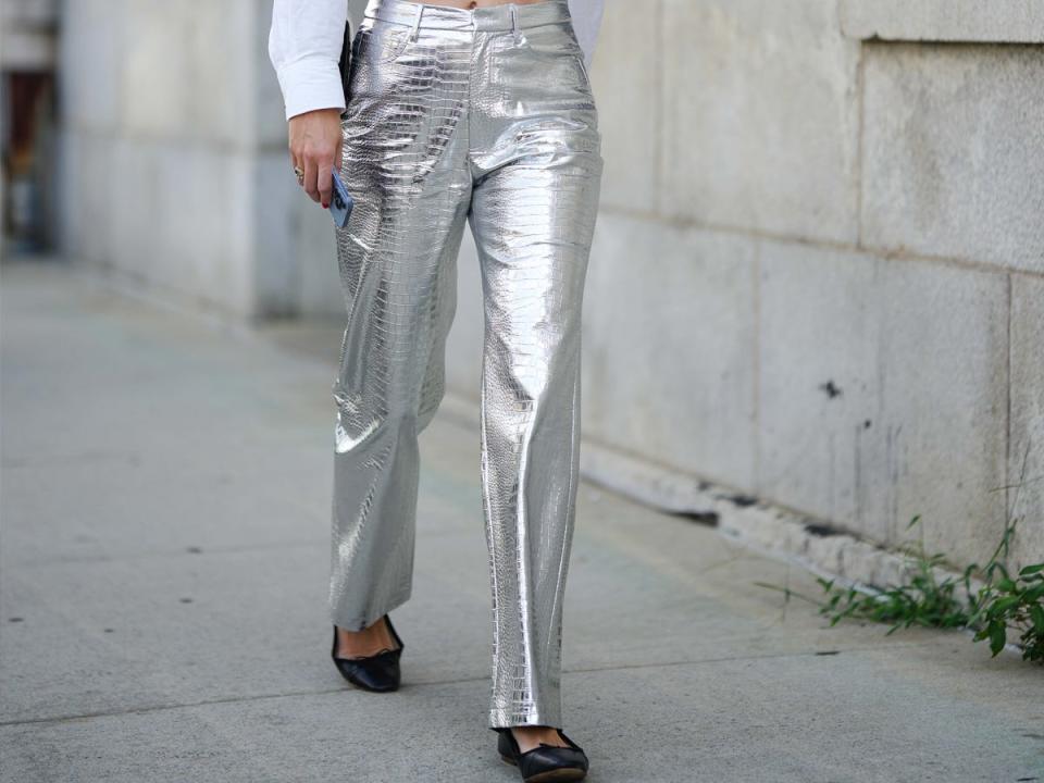 Metallic pants on a model.