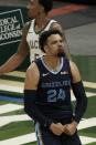Memphis Grizzlies' Dillon Brooks reacts after making a basket and being fouled during the first half of an NBA basketball game against the Milwaukee Bucks Saturday, April 17, 2021, in Milwaukee. (AP Photo/Morry Gash)
