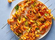 <p>These <a href="https://www.delish.com/cooking/recipe-ideas/recipes/a49855/cauliflower-wings-recipe/" rel="nofollow noopener" target="_blank" data-ylk="slk:buffalo cauliflower;elm:context_link;itc:0;sec:content-canvas" class="link ">buffalo cauliflower</a> kebabs put all your favorite flavor from <a href="https://www.delish.com/cooking/recipe-ideas/recipes/a51133/classic-buffalo-wings-recipe/" rel="nofollow noopener" target="_blank" data-ylk="slk:classic buffalo wings;elm:context_link;itc:0;sec:content-canvas" class="link ">classic buffalo wings</a> onto skewers–and they're vegetarian to boot! Glaze the kebabs with more buffalo sauce, grill until the cauliflower is tender, then drizzle with <a href="https://www.delish.com/cooking/recipe-ideas/a38768697/blue-cheese-dressing-recipe/" rel="nofollow noopener" target="_blank" data-ylk="slk:blue cheese dressing;elm:context_link;itc:0;sec:content-canvas" class="link ">blue cheese dressing</a>.</p><p>Get the <strong><a href="https://www.delish.com/cooking/recipe-ideas/a39540046/buffalo-cauliflower-kebabs-recipe/" rel="nofollow noopener" target="_blank" data-ylk="slk:Buffalo Cauliflower Kebabs recipe;elm:context_link;itc:0;sec:content-canvas" class="link ">Buffalo Cauliflower Kebabs recipe</a></strong>.</p>