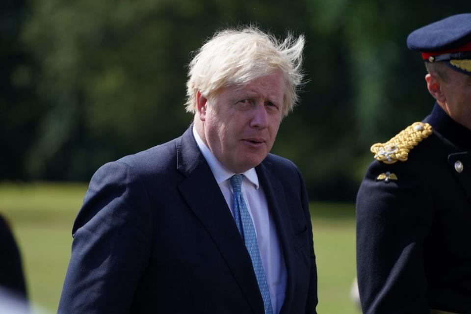 Boris Johnson is under pressure to cancel a planned cut in Universal Credit (Steve Parsons/PA) (PA Wire)