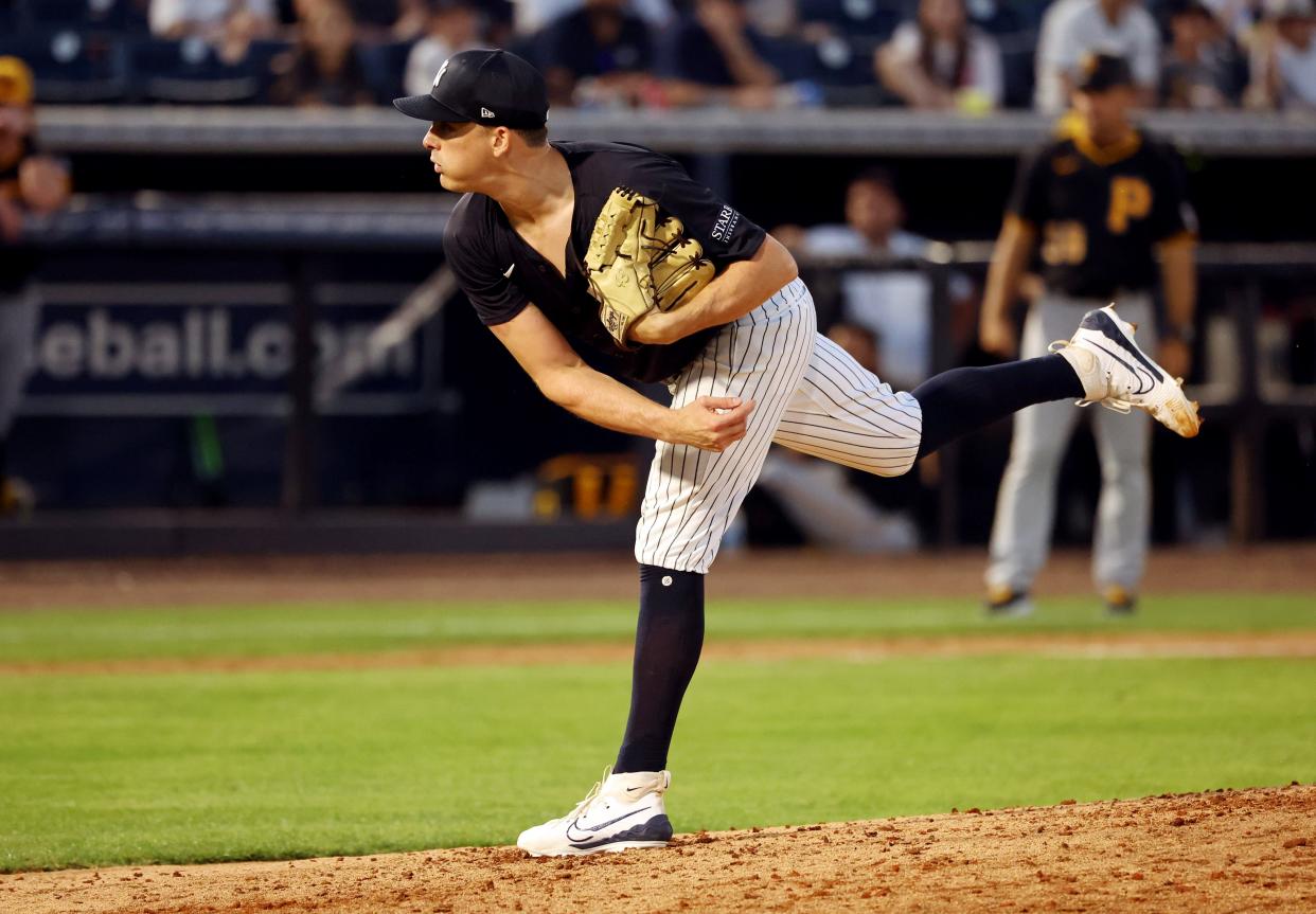 Mar 15, 2024; Tampa, Florida, USA; New York Yankees pitcher Nick Burdi (57) pitches during the fifth inning against the Pittsburgh Pirates at George M. Steinbrenner Field.