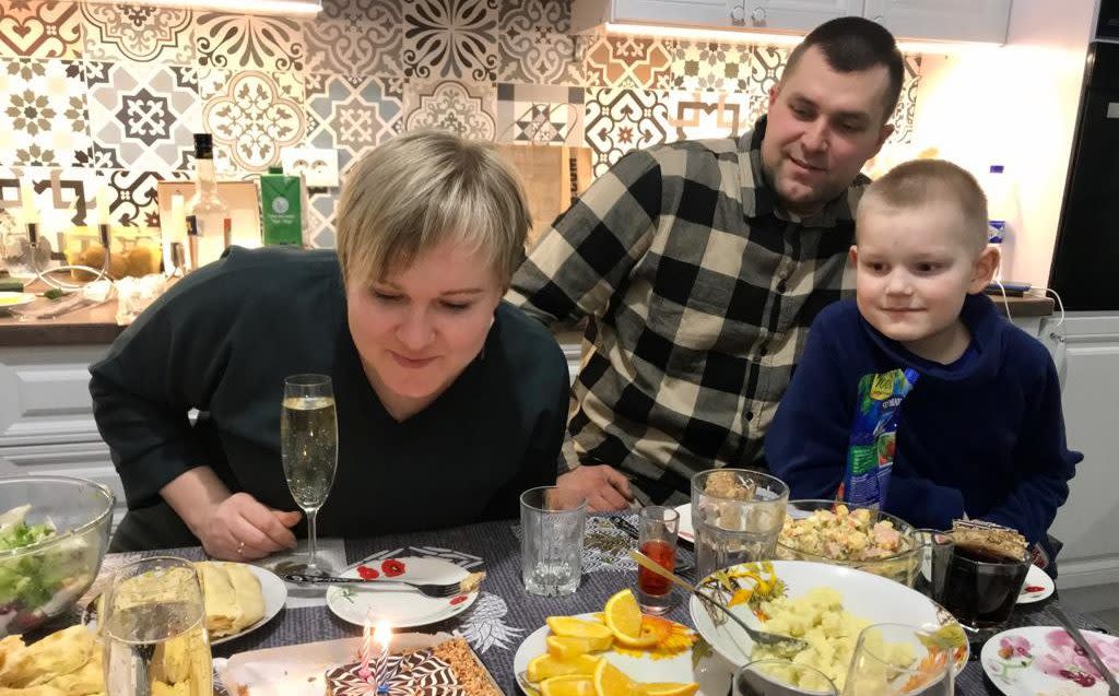 Olga Sychevska, who was killed in the attack, with her husband and son 