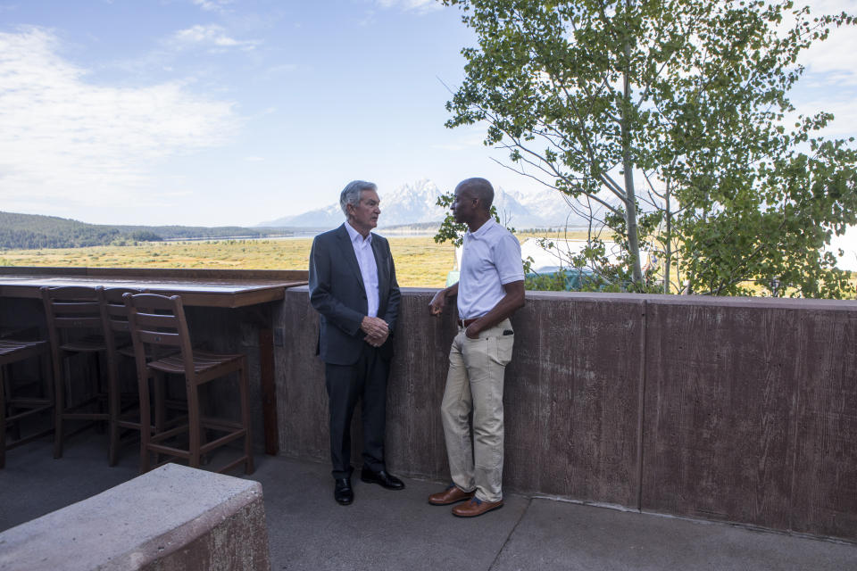 FILE - Federal Reserve Chairman Jerome Powell, left, chats with economist Philip Jefferson outside the Jackson Hole Economic Symposium near Moran in Grand Teton National Park, WY., Friday, Aug. 25, 2023. (AP Photo/Amber Baesler, File)