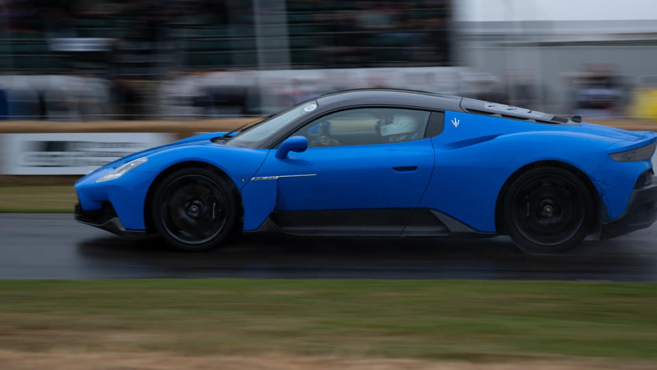 A car racing on as track at Goodwood