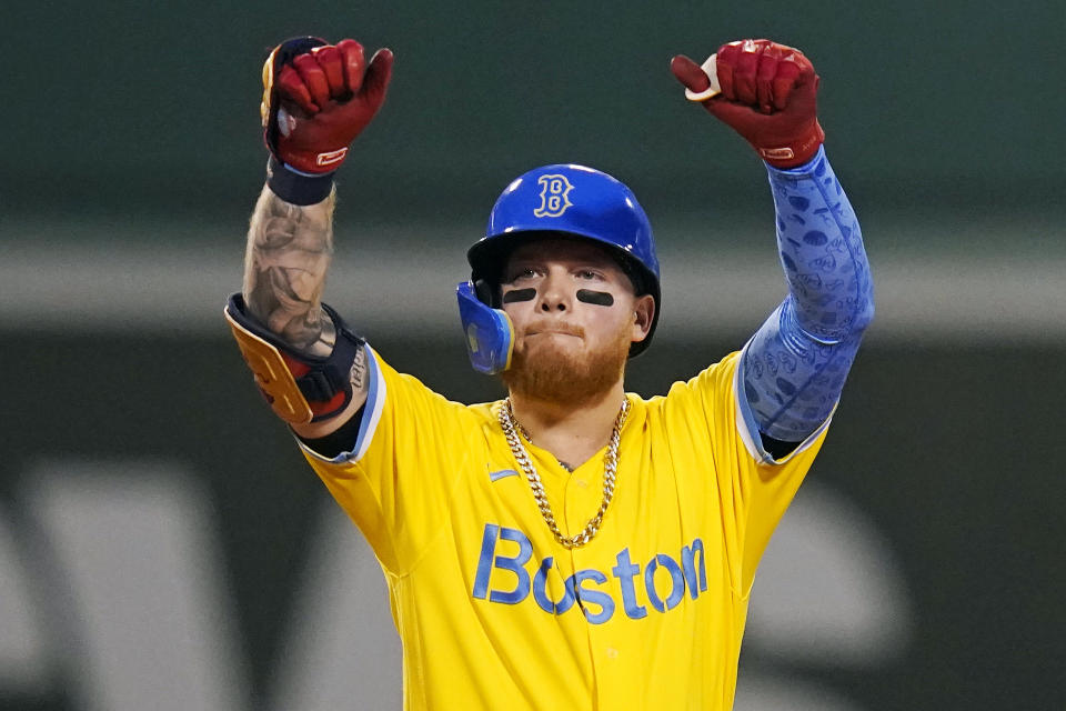 Boston Red Sox's Alex Verdugo celebrates after his RBI-double during the sixth inning of a baseball game against the Cleveland Guardians at Fenway Park, Monday, July 25, 2022, in Boston. (AP Photo/Charles Krupa)