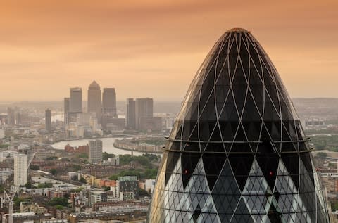 A ride in a helicopter over the Thames puts all of the monuments - and the twisting river - into perspective - Credit: Getty Images Contributor/Sergio Amiti