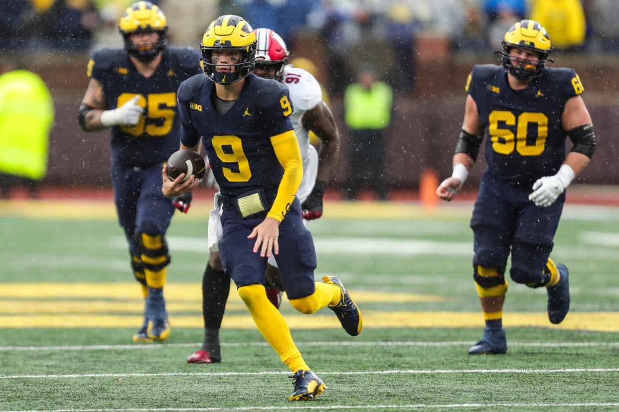 Michigan quarterback J.J. McCarthy runs against Indiana during the second half of U-M's 52-7 win over Indiana on Saturday, Oct. 14, 2023, in Ann Arbor.