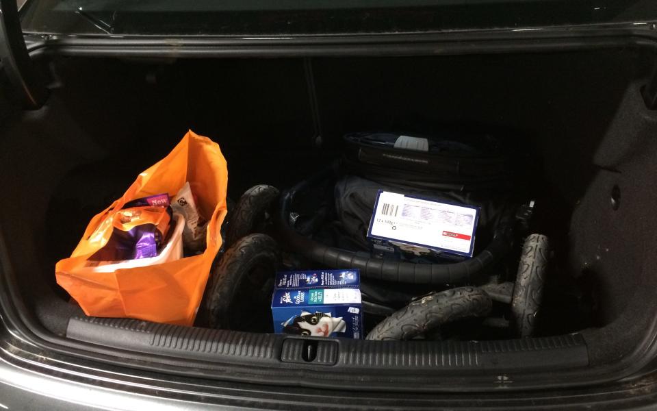 Audi A3 Saloon boot loaded with baby buggy