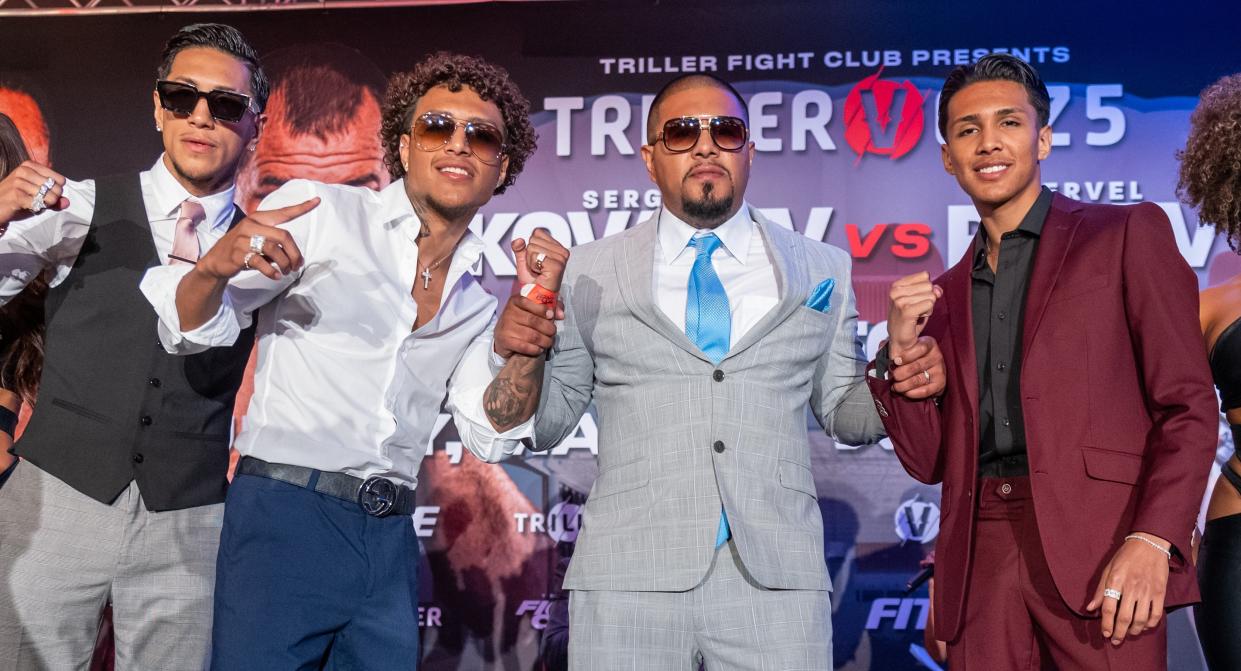 Fernando Vargas poses with his sons Fernando Jr., Amado and Emiliano during a news conference Thursday to promote Saturday's fight card in Inglewood.