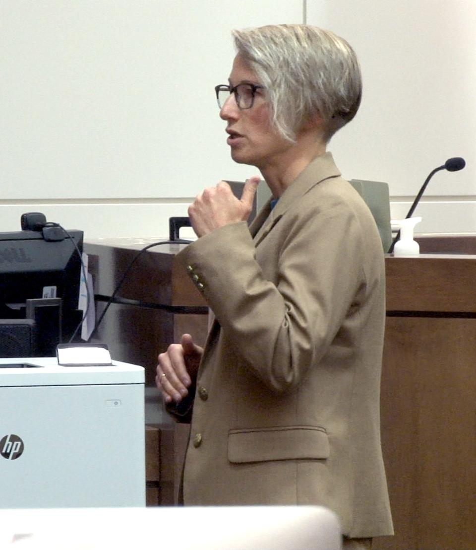 Monmouth County Assistant Prosecutor Kristen Anastos delivers her opening statement during Terry Kuo's retrial before Superior Court Judge Jill O'Malley at the Monmouth County Courthouse in Freehold Thursday, September 21, 2023. Kuo is a former youth tennis instructor charged with child pornography and sexually assaulting an underaged student.