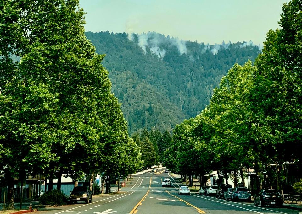 Smoke rises from the Campbell Fire on Sunday, Aug. 7, 2022, from downtown Willow Creek along Highway 299.