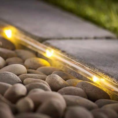 Or for something more subtle, line your patio with this copper tube solar light