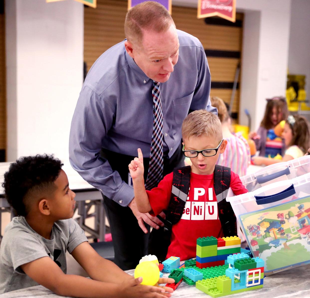 Trey Duke the Director of Schools for Murfreesboro City Schools speaks with students on their first day of school at Northfield Elementary on Monday, Aug. 7, 2023.